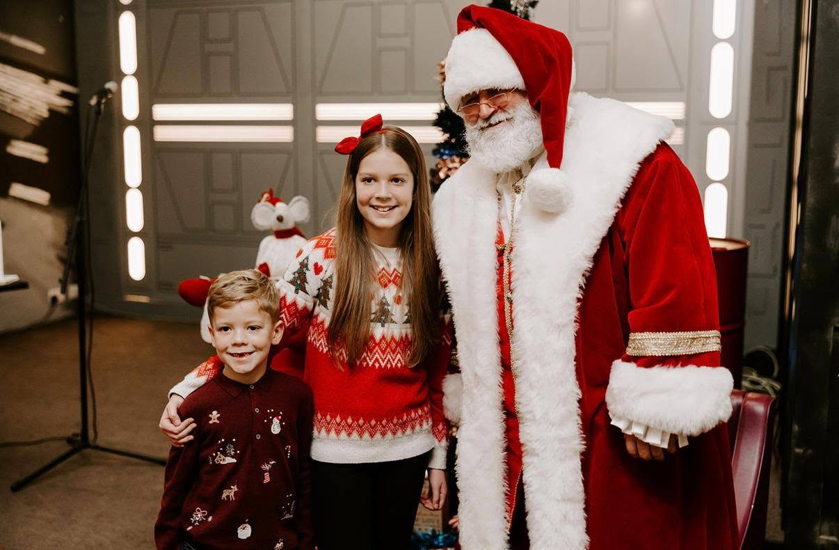 The Real Bearded Santa with a family at Christmas