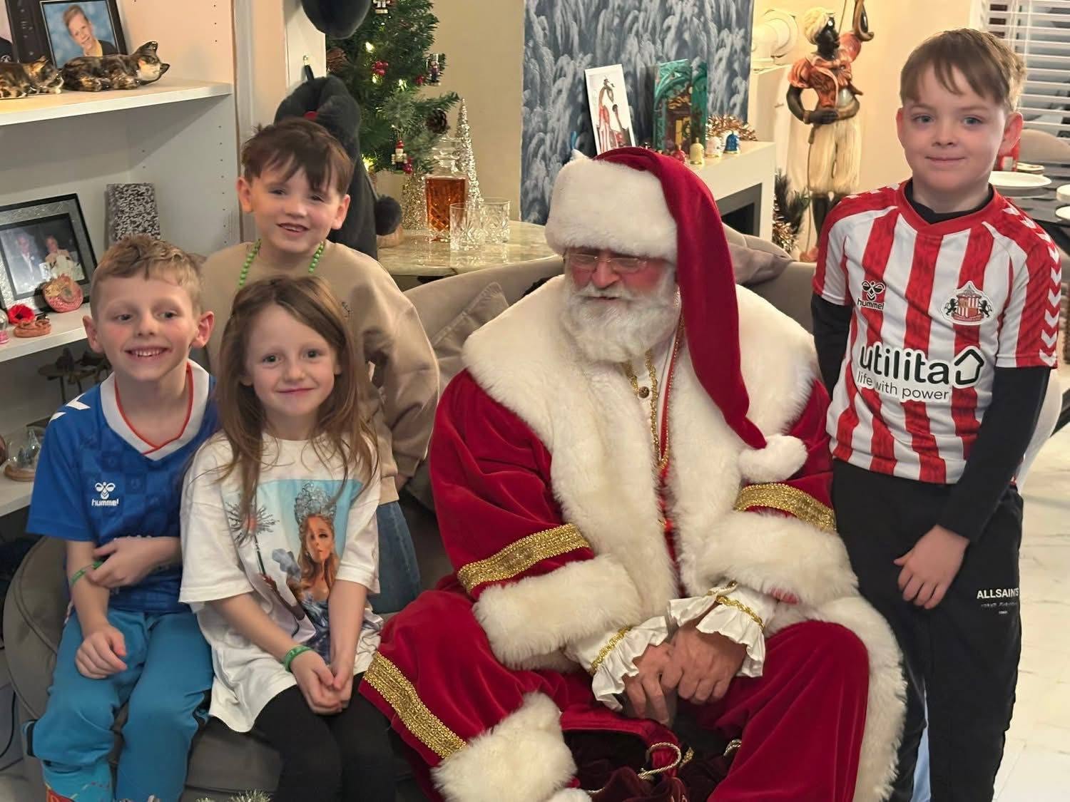 The Real Bearded Santa meeting children at home